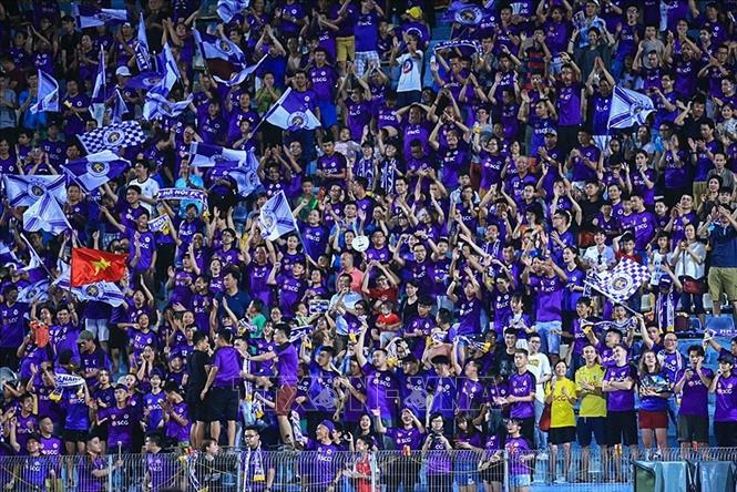 [23/06/2018 22:49:17] Trong ảnh: Cổ động viên đội tuyển Hà Nội FC. Ảnh: Trọng Đạt-TTXVN