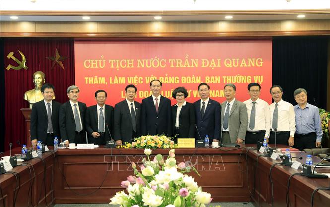 Chủ tịch nước Trần Đại Quang với các đại biểu tham dự buổi làm việc. Ảnh: Nhan Sáng-TTXVN