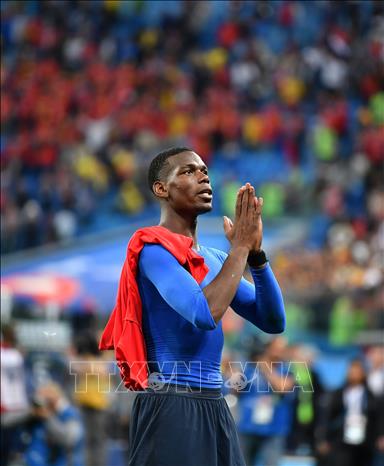 Trong ảnh: Niềm vui của cầu thủ Paul Pogba sau chiến thắng của Pháp trước Bỉ trong trận Bán kết World Cup 2018 tại Saint Petersburg, Nga ngày 10/7. Ảnh: THX/TTXVN