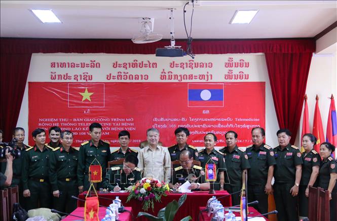 Trong ảnh: Quang cảnh Lễ ký bàn giao hệ thống Telemedicine mở rộng.  Ảnh: Phạm Kiên – Phóng viên TTXVN tại Lào