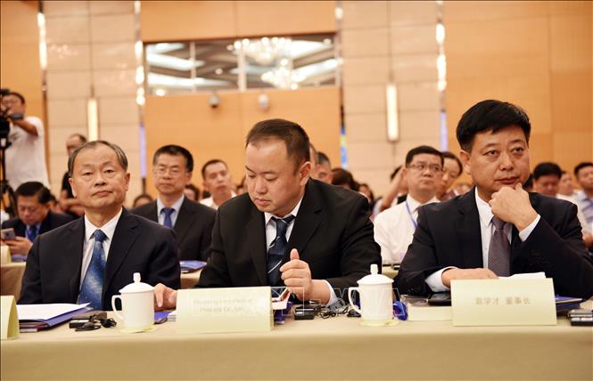 Trong ảnh: Chủ tịch Hội đồng quản trị một số doanh nghiệp Trung Quốc tham gia đối thoại. Ảnh: Lương Tuấn - Pv TTXVN tại Trung Quốc
