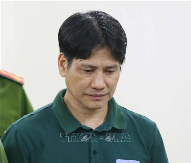 Trong ảnh: Bị cáo Nguyễn Hữu Bách nghe tòa tuyên án. Ảnh: Doãn Tấn - TTXVN