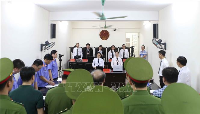 Trong ảnh: Quang cảnh phiên tòa. Ảnh: Doãn Tấn - TTXVN