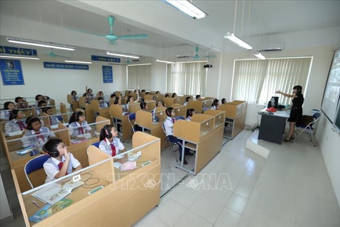Trong ảnh: Trường THCS Chu Văn An, xã Tứ Hiệp (Thanh Trì) - trường đạt chuẩn Quốc gia, được đầu tư xây dựng theo tiêu chí Nông thôn mới. Ảnh: Vũ Sinh – TTXVN