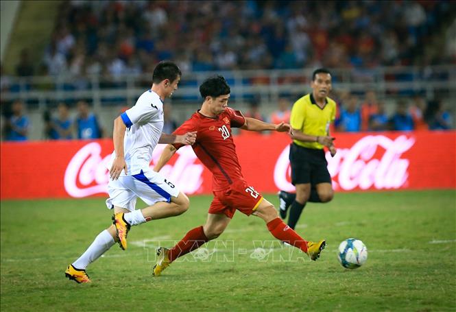 Trong ảnh: Pha dẫn bóng đột phá của tiền đạo Công Phượng (số 20, U23 Việt Nam). Ảnh: Trọng Đạt – TTXVN
