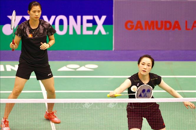 Trong ảnh: Cặp đôi VĐV Vũ Thị Trang (phải) và Vũ Thị Sen của Việt Nam. Ảnh: Quang Nhựt - TTXVN