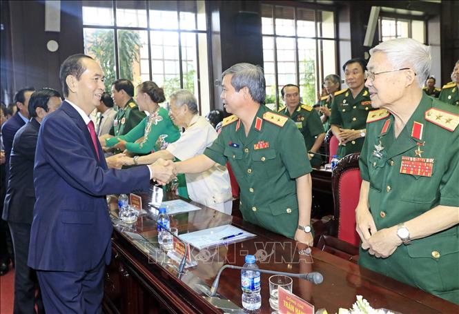 Trong ảnh: Chủ tịch nước Trần Đại Quang với các đại biểu tham dự Đại hội. Ảnh: Nhan Sáng-TTXVN
