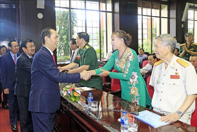 Trong ảnh: Chủ tịch nước Trần Đại Quang với các đại biểu tham dự Đại hội. Ảnh: Nhan Sáng - TTXVN