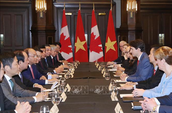 Trong ảnh: Thủ tướng Canada Justin Trudeau đón và hội đàm với Thủ tướng Nguyễn Xuân Phúc, chiều 10/6/2018 (theo giờ địa phương) tại thành phố Quebec, Canada. Ảnh: Thống Nhất –TTXVN