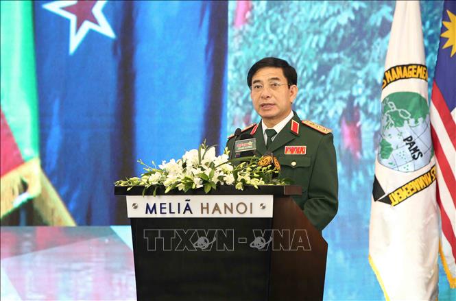Trong ảnh: Thượng tướng Phan Văn Giang, Tổng Tham mưu trưởng, Thứ trưởng Bộ Quốc phòng phát biểu khai mạc hội thảo. Ảnh: Dương Giang – TTXVN