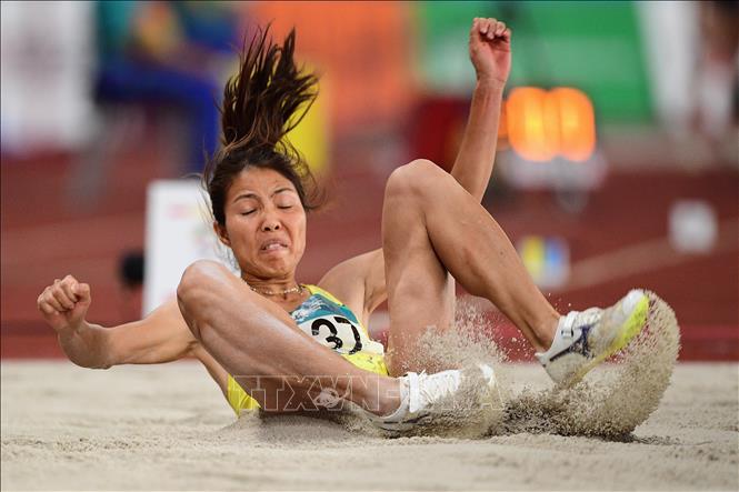 Trong ảnh: VĐV Bùi Thị Thu Thảo trong phần thi nhảy xa nữ tại ASIAD 2018, Jakarta, Indonesia ngày 27/8. Ảnh: AFP/ TTXVN