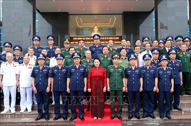 Photo: NA Chairwoman Nguyen Thi Kim Ngan poses for a group photo with delegates at the ceremony. VNA Photo: Trọng Đức 