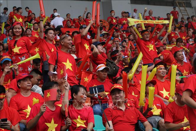 Photo: Vietnamese football fans during the match. VNA Photo: Hoàng Linh

