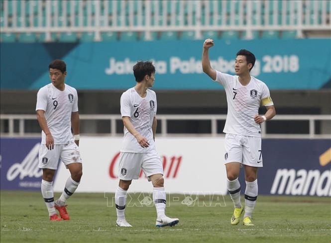 Photo: Korean players celebrate their goal during the match. VNA Photo: Hoàng Linh