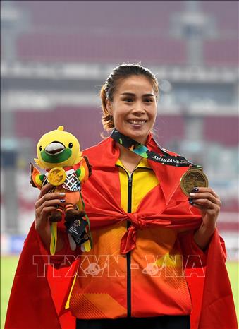 Trong ảnh: Nhà đương kim vô địch SEA Games 29 Vũ Thị Mến giành Huy chương Đồng ở nội dung nhảy ba bước nữ môn điền kinh tại ASIAD 2018 ở Jakarta, Indonesia ngày 30/8. Ảnh: AFP/TTXVN