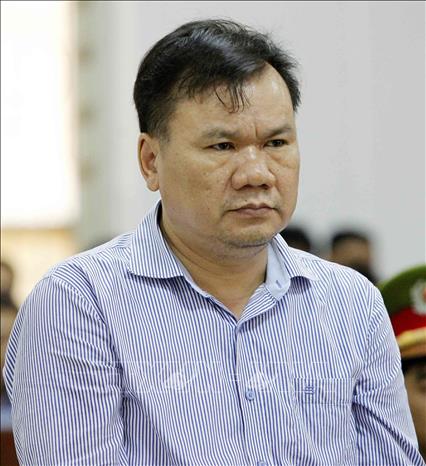 Trong ảnh: Bị cáo Đỗ Văn Hồng (sinh năm 1967, Chủ tịch Hội đồng quản trị kiêm Tổng Giám đốc Công ty Cổ phần Đầu tư và Xây lắp Dầu khí Kinh Bắc - PVC.KBC) bị tuyên phạt 13 năm tù. Ảnh: Văn Điệp - TTXVN