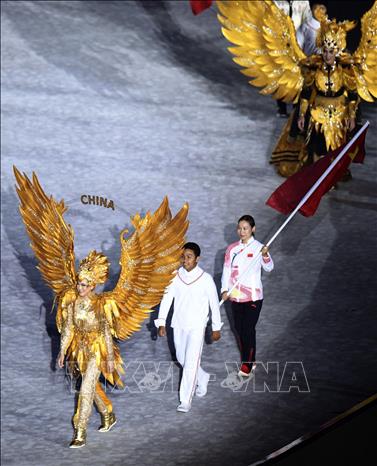 Trong ảnh: Đoàn thể thao Trung Quốc tiến vào sân vận động Gelora Bung Karno ở thủ đô Jakarta, Indonesia trong lễ bế mạc tối 2/9. Ảnh: THX/TTXVN