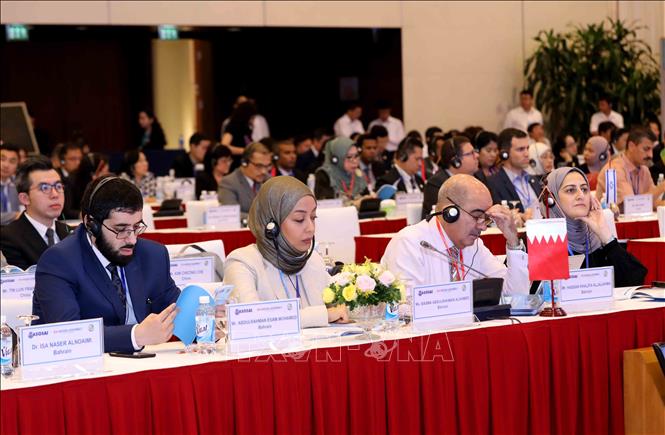 Photo: The delegation of the Audit Directorate of Bahrain at the symposium. VNA Photo