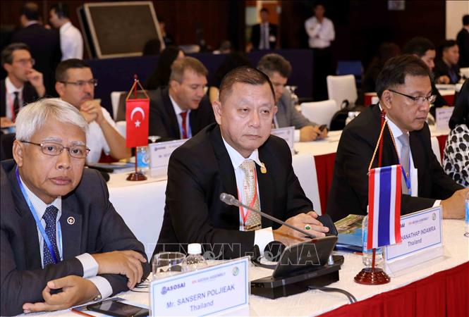 Photo: The delegation of the State Audit Office of Thailand at the symposium. VNA Photo