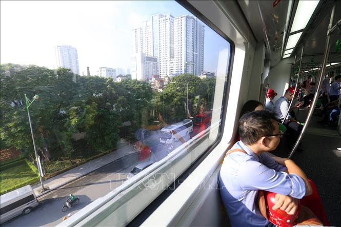 Photo: Beside a train’s window during the trial operation. VNA Photo: Huy Hùng