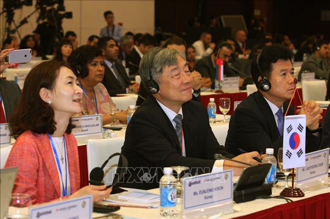 Photo: The delegation of the Board of Audit and Inspection of the Republic of Korea at the 7th symposium. VNA Photo