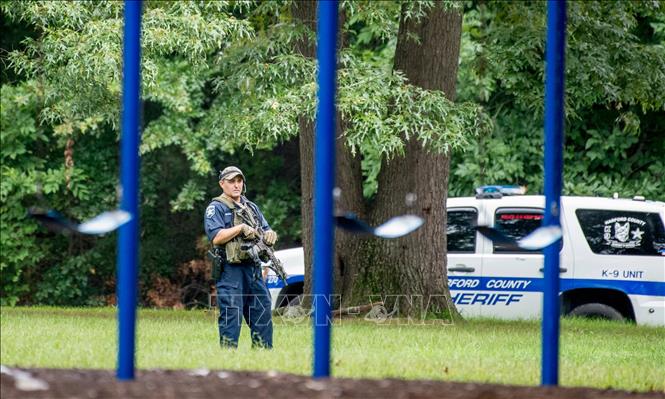 Trong ảnh: Cảnh sát phong tỏa hiện trường vụ nổ súng ở Harford, bang Maryland ngày 20/9/2018. Ảnh: EPA/ TTXVN
