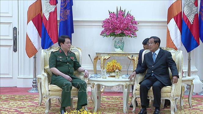 Trong ảnh: Thủ tướng Hun Sen tiếp Thượng tướng Lương Cường. Ảnh:  Phóng viên TTXVN tại Campuchia

