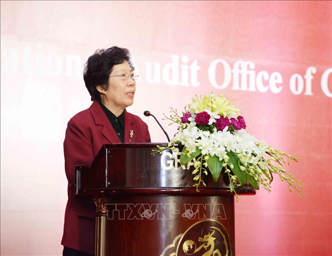 Trong ảnh: Tổng Kiểm toán Nhà nước Trung Quốc, bà HU Zejun phát biểu tại buổi tiệc chiêu đãi. Ảnh: TTXVN