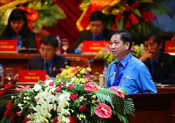 Trong ảnh: Ông Phạm Bá Vĩnh, Phó Chủ tịch Liên đoàn Lao động Thành phố Hà Nội trình bày tham luận. Ảnh: TTXVN