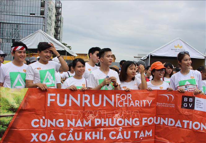 Trong ảnh: Chương trình chạy bộ Fun run với những mục đích tốt đẹp. Ảnh: Xuân Dự - TTXVN 