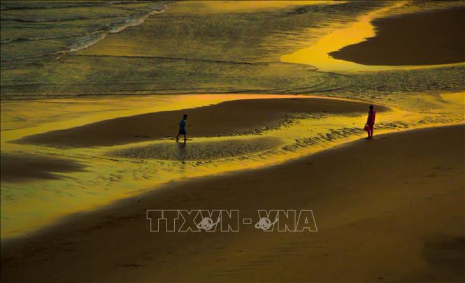 Photo: Back Beach at dusk. VNA Photo: Duy Khương