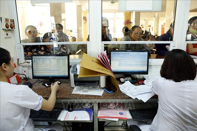Trong ảnh: Bệnh viện Đa khoa Hà Tĩnh ứng dụng công nghệ thông tin quản lý khám chữa bệnh và thanh toán chi phí. Ảnh: Dương Ngọc – TTXVN