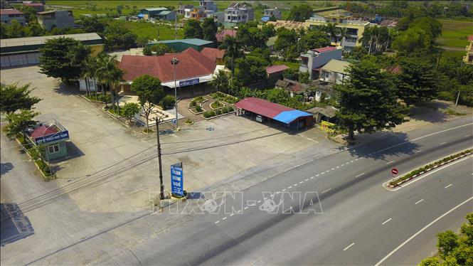 Trong ảnh: Quang cảnh đìu hiu vắng vẻ tại trạm dừng nghỉ Ninh Bình trên QL1B. Ảnh: Minh Đức - TTXVN