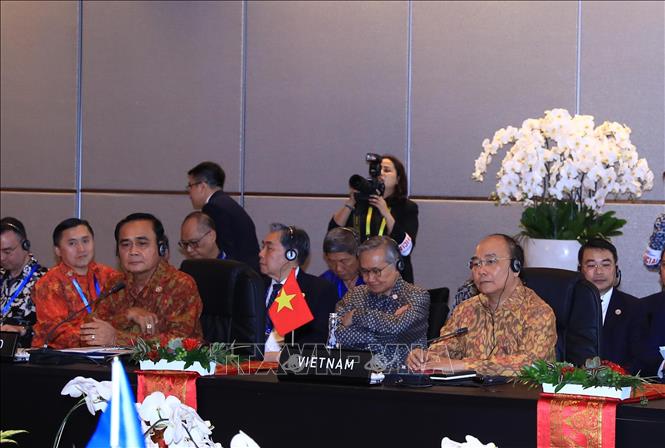 Trong ảnh: Thủ tướng Nguyễn Xuân Phúc và các trưởng đoàn tham dự cuộc gặp. Ảnh: Thống Nhất –TTXVN
