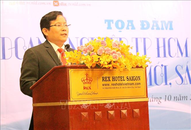 Trong ảnh: Ông Tô Đình Tuân, Tổng Biên tập Báo Người lao động, phát biểu khai mạc tọa đàm. Ảnh: Xuân Anh – TTXVN