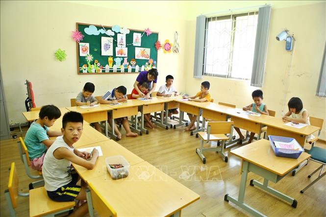Trong ảnh: Lớp chuẩn bị giúp các em đi học tại Trung tâm Phục hồi chức năng Việt – Hàn. Ảnh: Minh Quyết – TTXVN