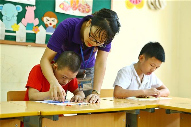 Trong ảnh: Lớp tiền học đường tại Trung tâm Phục hồi chức năng Việt – Hàn. Ảnh: Minh Quyết – TTXVN