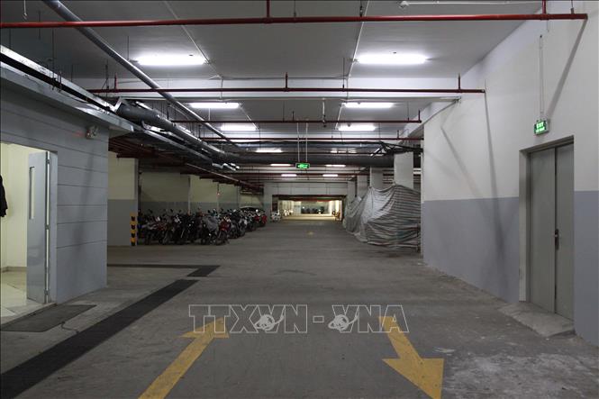 Trong ảnh: Một góc tầng hầm giữ xe của Chung cư Carina Plaza (Quận 8 – Thành phố Hồ Chí Minh) sau khi hoàn tất cải tạo, sửa chữa. Ảnh: Thanh Vũ - TTXVN
