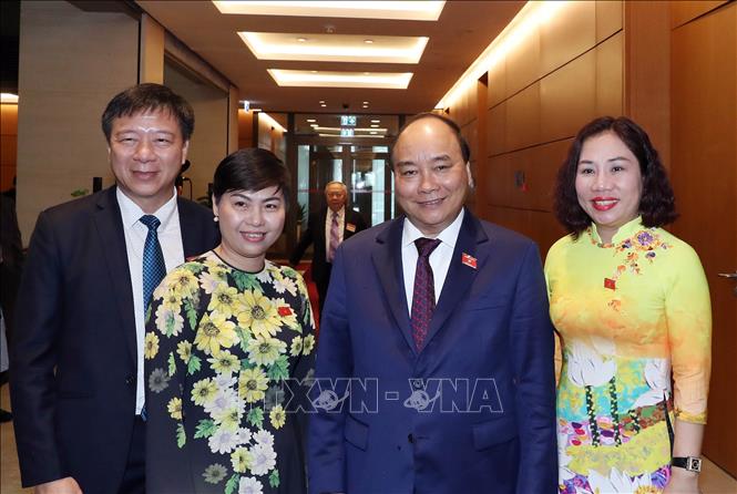 Trong ảnh: Thủ tướng Nguyễn Xuân Phúc và các đại biểu dự khai mạc Kỳ họp thứ sáu, Quốc hội khóa XIV. Ảnh: Thống Nhất – TTXVN