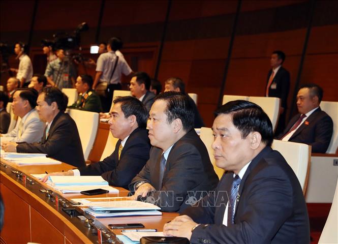 Trong ảnh: Các đại biểu tại Phiên khai mạc Kỳ họp thứ sáu, Quốc hội khóa XIV. Ảnh: Thống Nhất – TTXVN