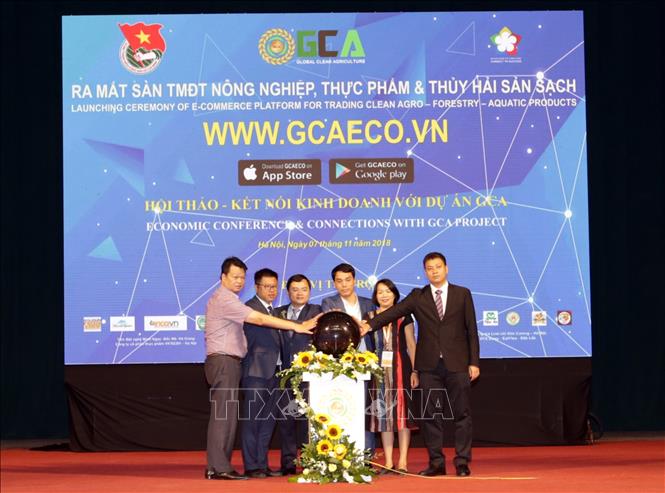 Trong ảnh: Nghi thức ra mắt trang thương mại điện tử www.gcaeco.vn. Ảnh: Trần Việt - TTXVN