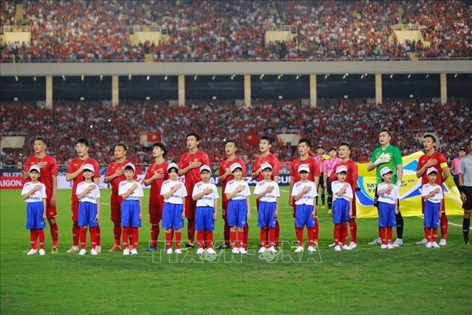 Trong ảnh: Các tuyển thủ Việt Nam chào cờ. Ảnh: Trọng Đạt – TTXVN