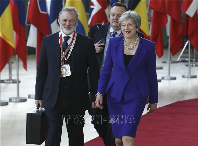 Trong ảnh: Thủ tướng Anh Theresa May (phải) tới dự Hội nghị thượng đỉnh Liên minh châu Âu ở Brussels, Bỉ ngày 18/10/2018. Ảnh: THX/ TTXVN
