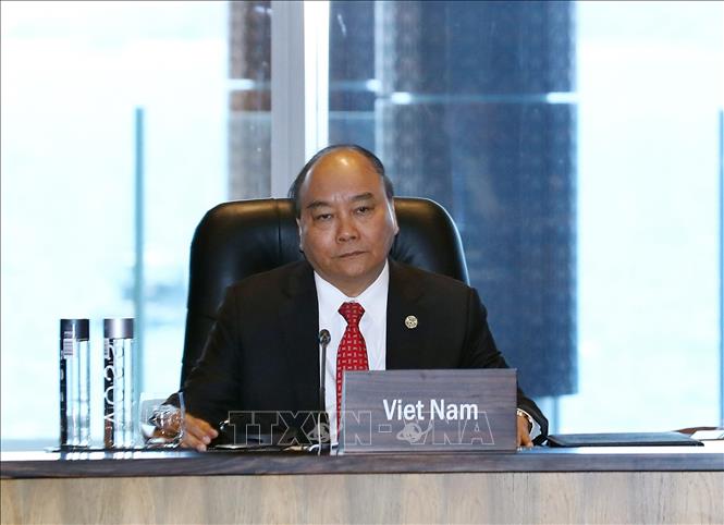 Trong ảnh: Thủ tướng Nguyễn Xuân Phúc dự Đối thoại giữa các Nhà lãnh đạo kinh tế APEC với Quỹ Tiền tệ Quốc tế. Ảnh: Thống Nhất – TTXVN