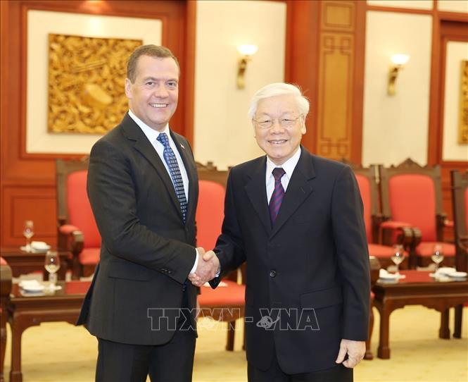 Photo: Party General Secretary and President Nguyen Phu Trong and Russian Prime Minister Dmitry Medvedev shake hands. VNA Photo: Trí Dũng