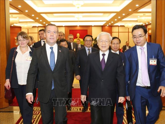 Photo: Party General Secretary and President Nguyen Phu Trong welcomes Russian Prime Minister Dmitry Medvedev. VNA Photo: Trí Dũng