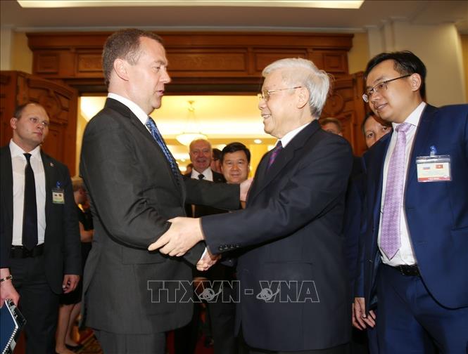 Photo: Party General Secretary and President Nguyen Phu Trong welcomes Russian Prime Minister Dmitry Medvedev. VNA Photo: Trí Dũng