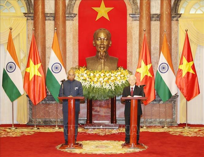 Photo: Party General Secretary and President Nguyen Phu Trong and Indian President Ram Nath Kovind at a press conference after their talks. VNA Photo: Trí Dũng