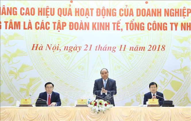 Trong ảnh: Thủ tướng Nguyễn Xuân Phúc và các Phó Thủ tướng Vương Đình Huệ, Trịnh Đình Dũng dự hội nghị. Ảnh: Thống Nhất – TTXVN