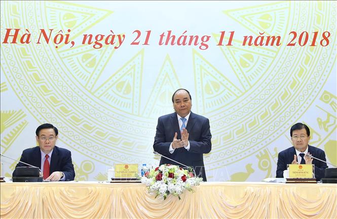 Trong ảnh: Thủ tướng Nguyễn Xuân Phúc và các Phó Thủ tướng Vương Đình Huệ, Trịnh Đình Dũng dự hội nghị. Ảnh: Thống Nhất – TTXVN